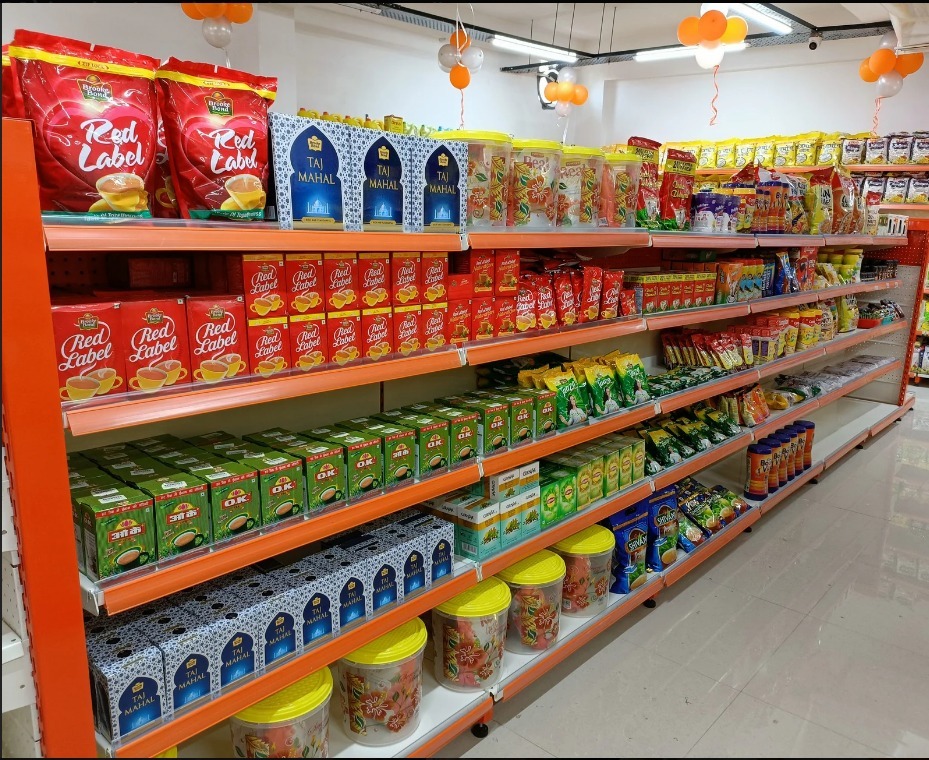 Rows of nutritious oats, muesli, corn flakes, and breakfast cereals packages on supermarket shelves